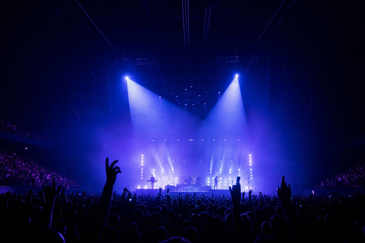 Arena concert stage with crowd and stage lights